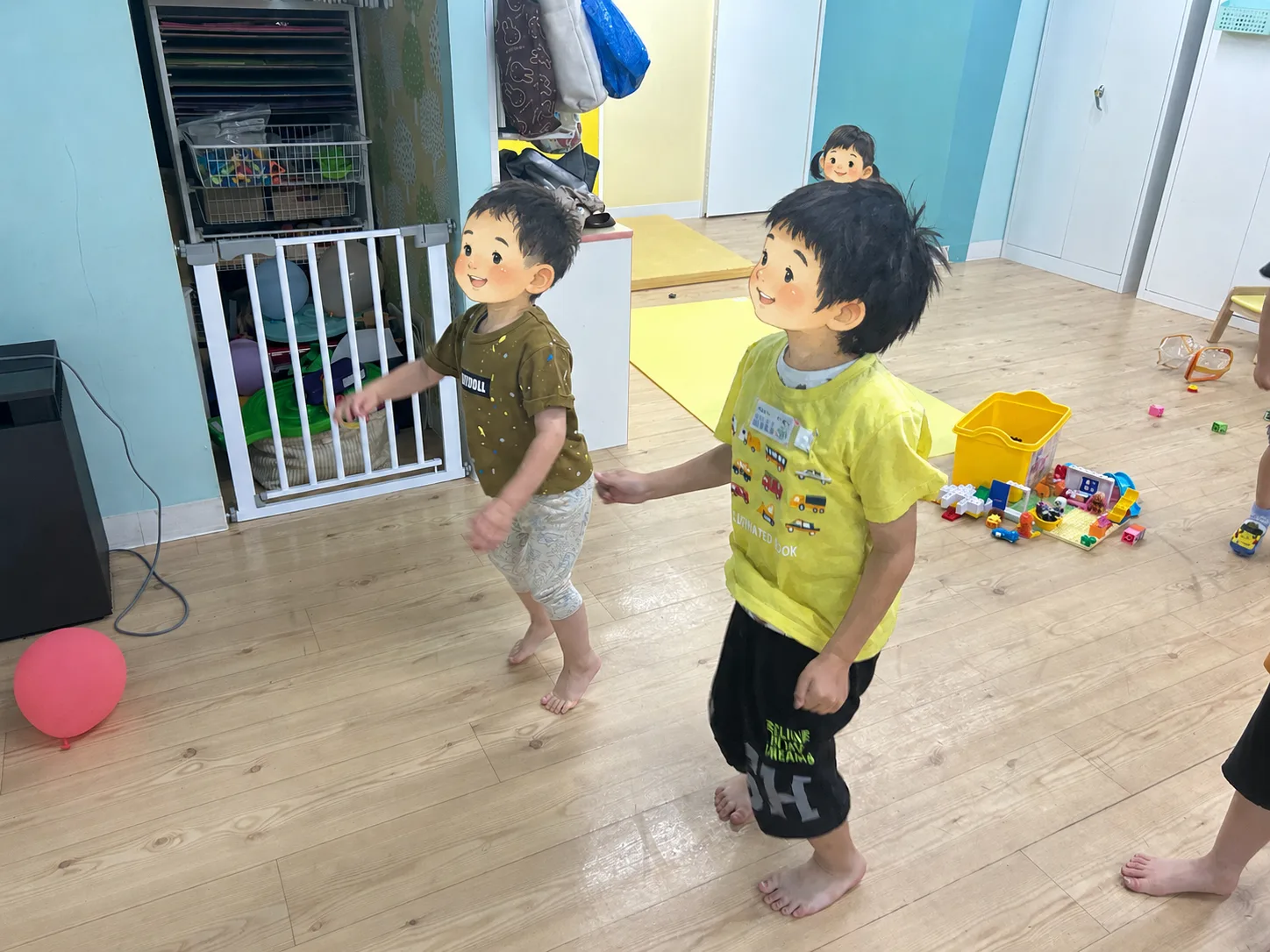 保育室でのダンス。音楽に合わせて体を動かします
